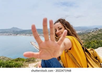 Horizontal View Woman Reaching Out Camera Stock Photo 2022471968