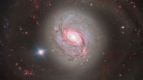 Swirling Galaxies Unite Around Red Quasar In Monster Black Hole Tech News