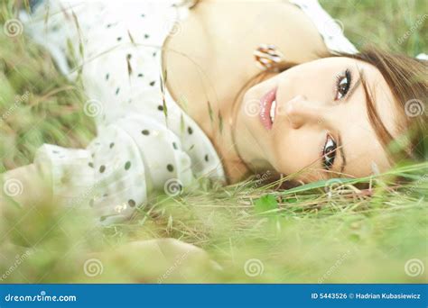 Beautiful Girl Lying Down Of Grass Royalty Free Stock Image Image