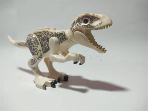 LEGO Tirex Miniature Red Eyed Dinosaur On A White Background Stock