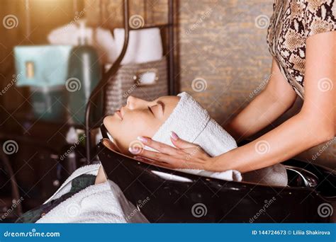 Beautiful Woman Washing Hair In A Hair Salon Stock Image Image Of