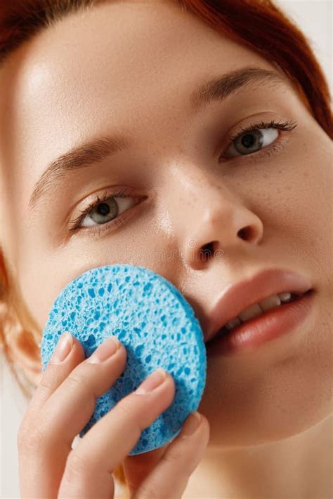 Beautiful Woman With Nude Makeup At Grey Background With Cleaning Sponge Skin Care Cosmetology