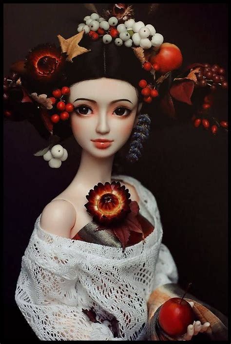 A Doll With A Flower In Her Hair