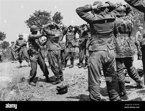 World War 2 German Soldiers Surrendering To Us Soldiers Stock Photo