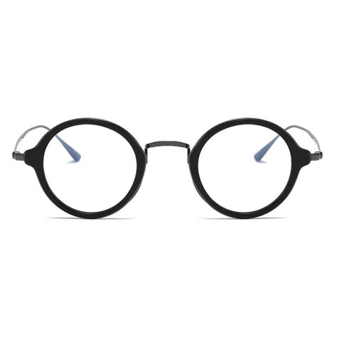 Lunettes Rondes Noires Design Pur Monture En Titane