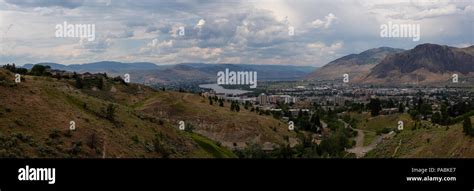 Aerial Panoramic View Of Kamloops City During A Cloudy Summer Day