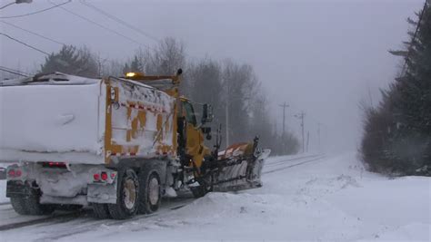 SPRINGHILL, NOVA SCOTIA, CANADA - FEBRUARY 9 2013 - Snow Plow Turning ...