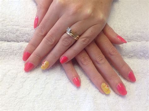 Tropic And Bicycle Yellow Shellac Manicure With Hand Painted Flower Nail Art