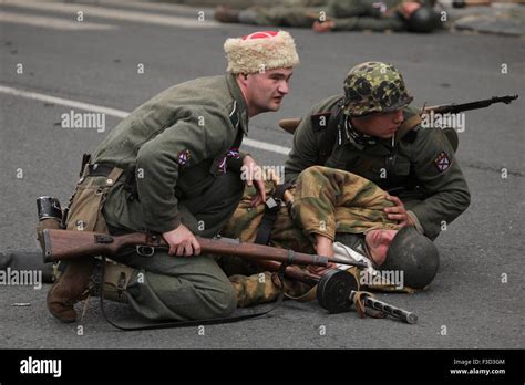 Reenactors uniformed as soldiers of the Russian Liberation Army (ROA ...