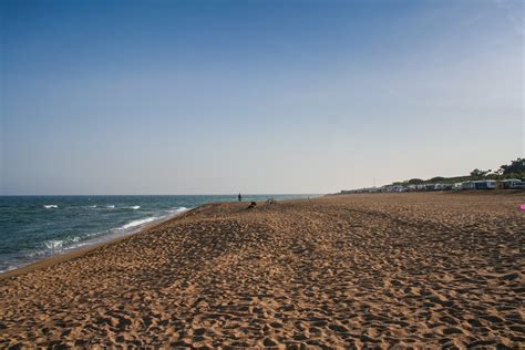 Deserted beach in the resort village of Santa Susanna. Barcelona, Catalonia, Spain. May 2006 ...