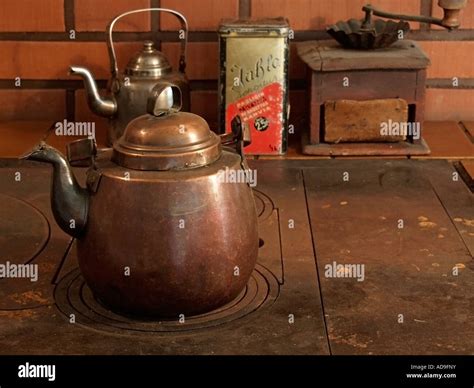 Old Copper Coffee Pot On An Oven Stock Photo Alamy