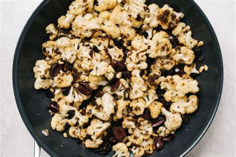 Roasted Cauliflower With Olives Raisins And Pine Nuts Our Salty Kitchen