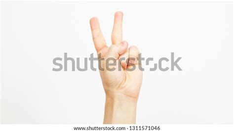 Man Hand Victory Sign Gesture Isolated Stock Photo 1311571046