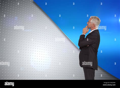 Composite Image Of Thoughtful Mature Businessman Posing Stock Photo Alamy