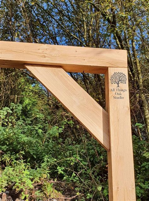 A Wooden Structure In Front Of Some Trees