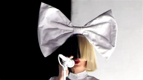 Why Does Sia Cover Her Face? Comprehensively Explained