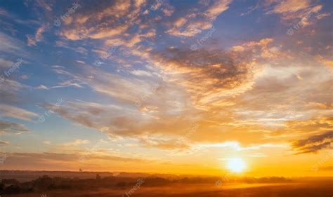 Premium Photo | The dawn sky over the village A wonderful morning landscape