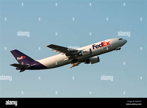 A Federal Express (FedEx) Airbus A300 cargo jet departs from Vancouver ...