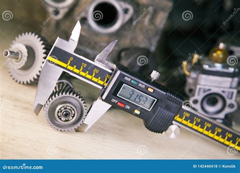 Measurement of the Details by a Digital Caliper Stock Photo - Image of ...