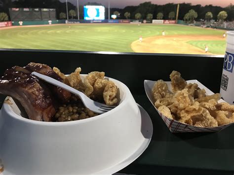 So the local Riverdogs baseball team serves beans and ribs in a dog food bowl - pork rinds extra ...