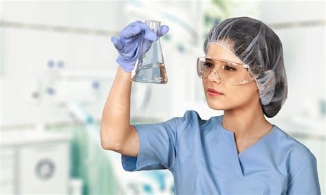 Premium Photo Female Scientist Working With Microscope On Background