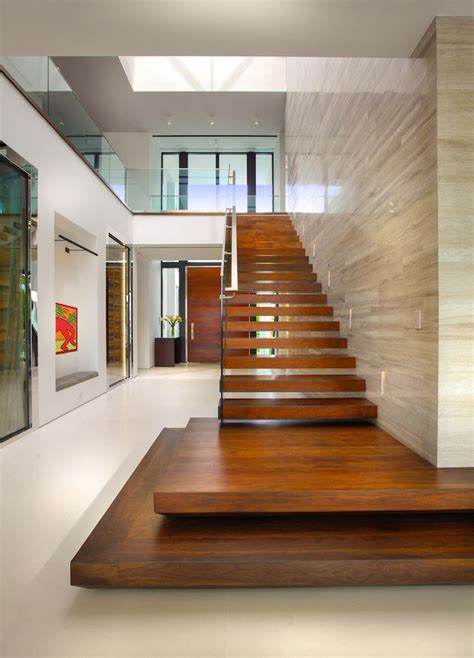 The Stairs Are Made Of Wood And Glass