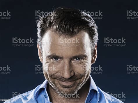 Man Portrait Smiling Malicious Sneaky Stock Photo Download Image Now