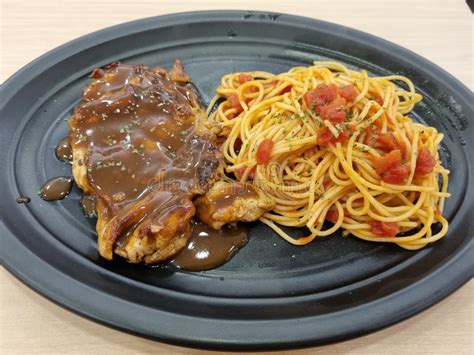 Chicken Chop With Black Pepper Sauce And Spaghetti Stock Photo Image