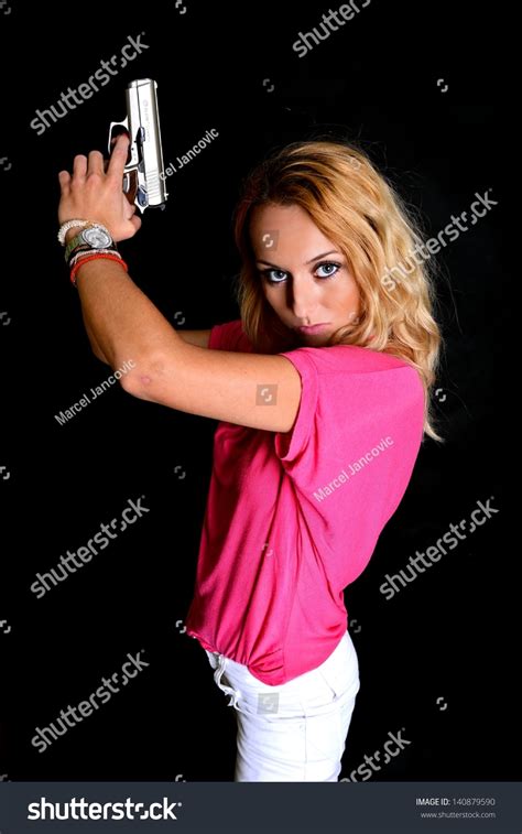 Sexy Woman Holding Gun Stock Photo 140879590 Shutterstock