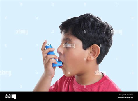 Little Boy Using An Inhaler Stock Photo Alamy