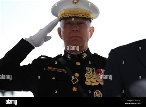 General James T Conway Commandant Of The Marine Corps Salutes The Colors During The