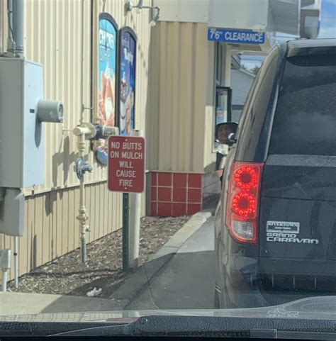 Confusing Drive Thru Sign Do Butts On Mulch Cause Fires Or Keep Fires