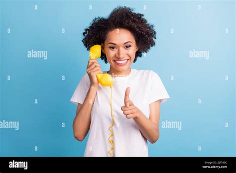 Portrait Of Attractive Brunette Cheerful Girl Calling Pointing At You Isolated Over Bright Blue