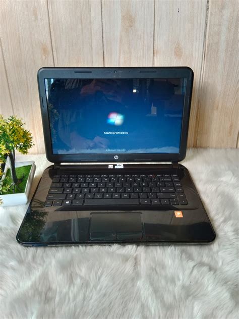 Laptop HP 14 D010AU AMD E1 2100 RAM 4 GB HDD 320 GB Pusat