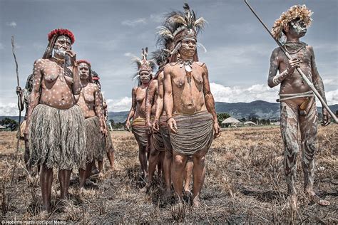 Indonesian Tribe Hunt With Spears And Sacrifice Pigs To Celebrate