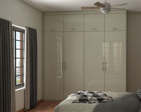 Modern Compact Wardrobe Design With Glossy Shutters Livspace