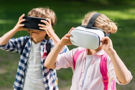 Kids with vr headsets stock image. Image of friends - 103918377