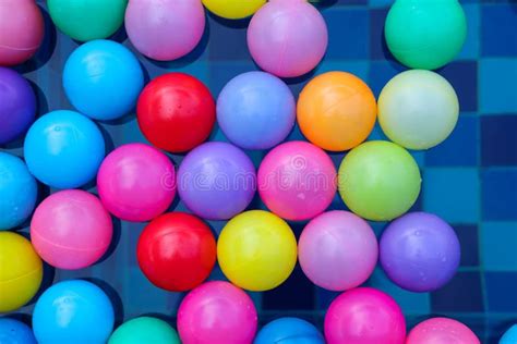 Many Colorful Plastic Balls Floating In Pool Stock Photo Image Of