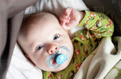 Baby Boy With Pacifier Stock Photo Dissolve