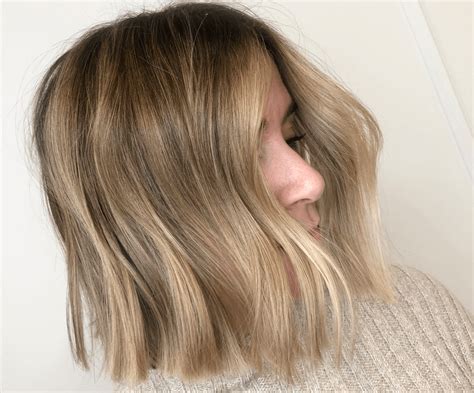 Mechas rubias en pelo castaño tendencias Salón Cristina Cisneros