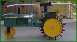 John Deere Green Tractor Traveling Water Sprinkler 4010