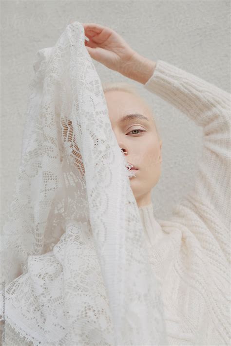 Portrait Of A Girl In White With White Lace By Stocksy Contributor