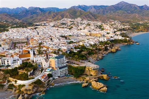 Aerial View Of Spanish Tourist City Of Nerja On Mediterranean Coast