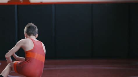 Premium stock video - Teenage wrestler working on his stance and motion ...