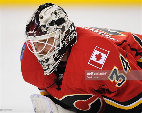 Miikka Kiprusoff of the Calgary Flames warms-up before an NHL game ...