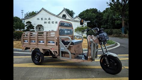 A Rose Gold Coloured LVBAO Electric Cargo Tricycle With Flippable