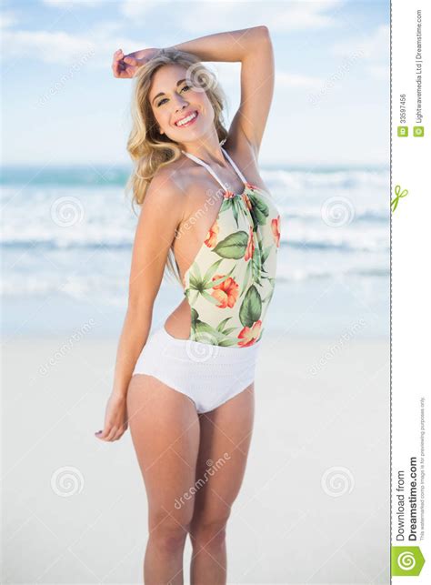 Happy Blonde Model In Swimsuit Looking At Camera Stock Photo Image Of Waves Looking