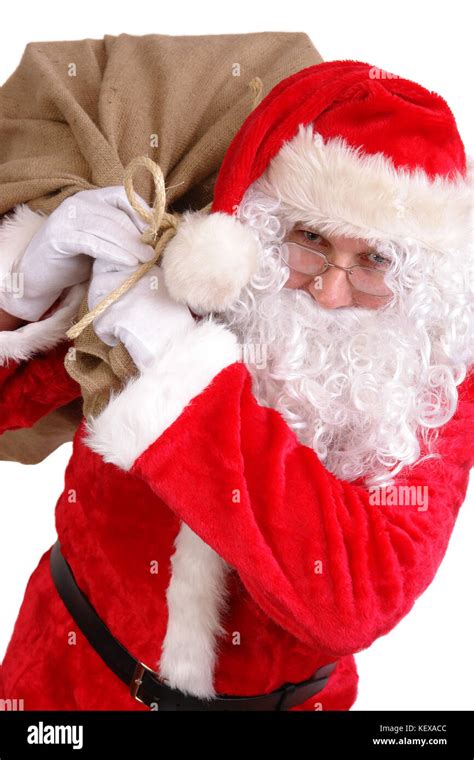 Santa Claus Carrying Big Sack On His Shoulder Full Of Christmas