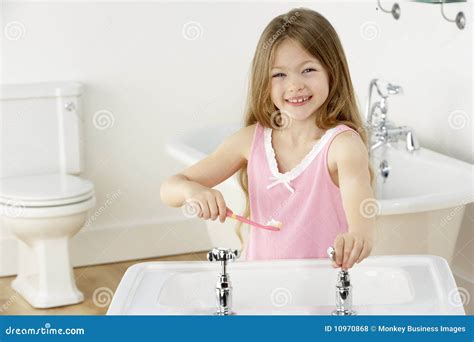 Young Girl Brushing Teeth At Sink Stock Photo Image Of Teeth Home