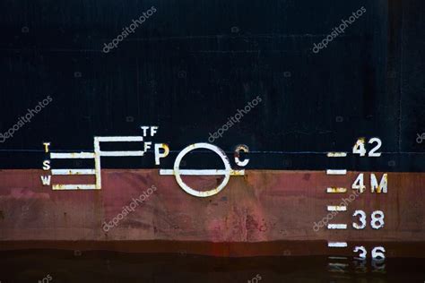 Waterline ship displacement marked on the ship side — Stock Photo © yos ...